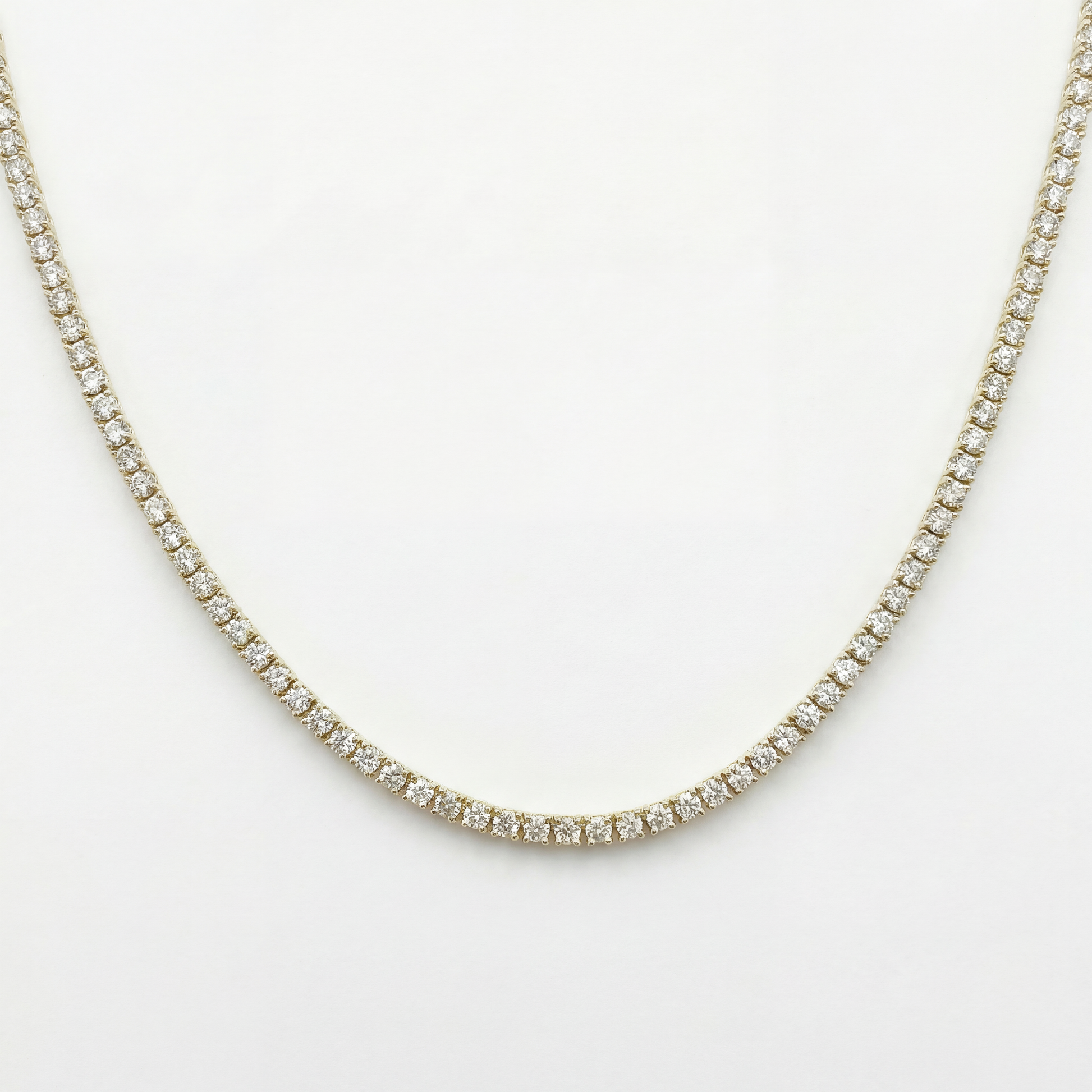 Diamond necklace on a light gray background