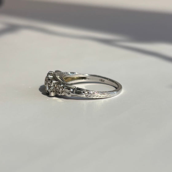 1920 Floral Three Stone