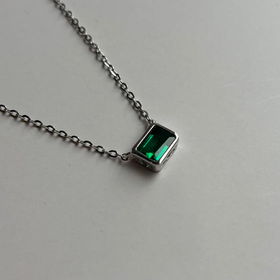 East-West Emerald Pendant