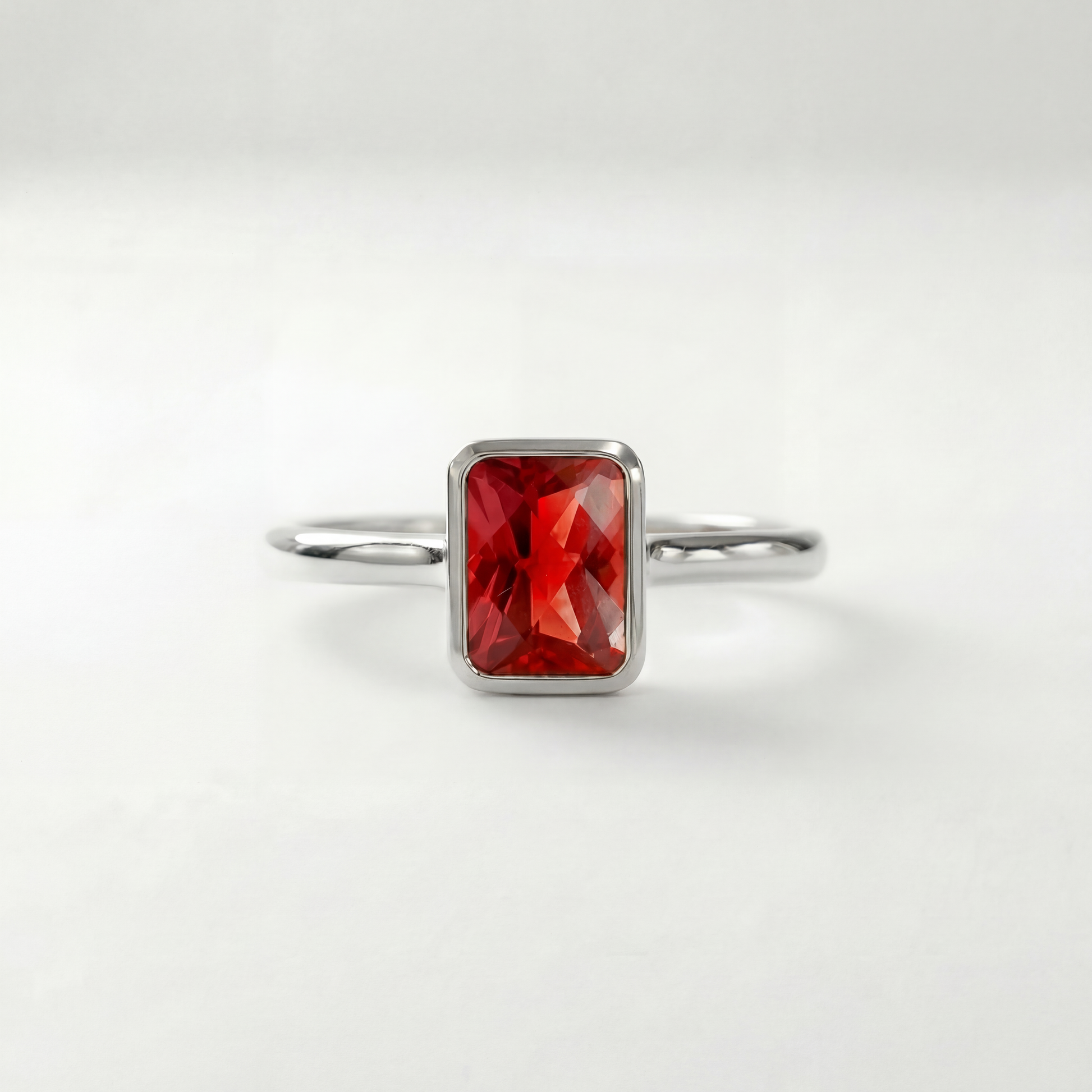 The Classic Bezel Ring | Lab-Grown Orange Sapphire